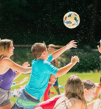 home-water-soccer five kids playing water soccer